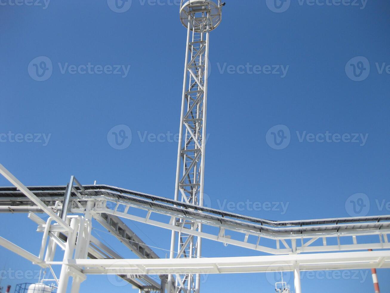 The tank with water and a ladder. photo