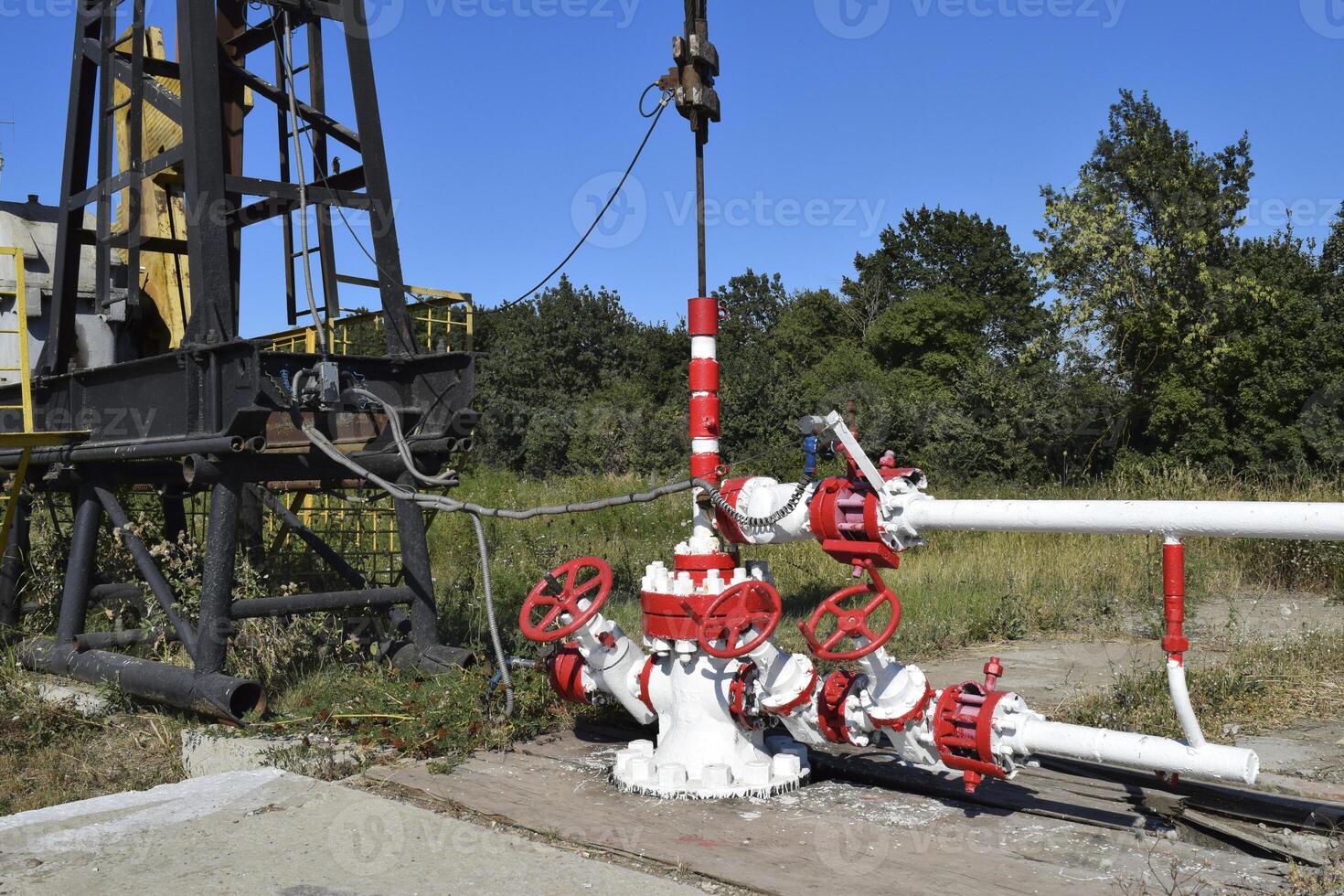 Pumping unit as the oil pump installed on a well photo