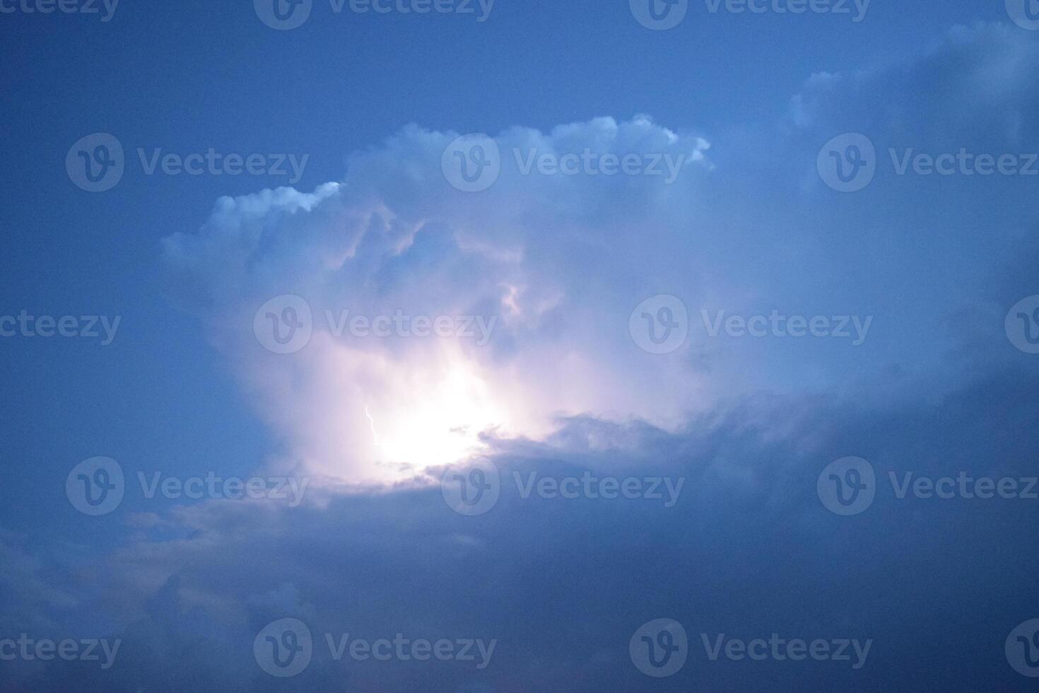 Lightnings in storm clouds photo