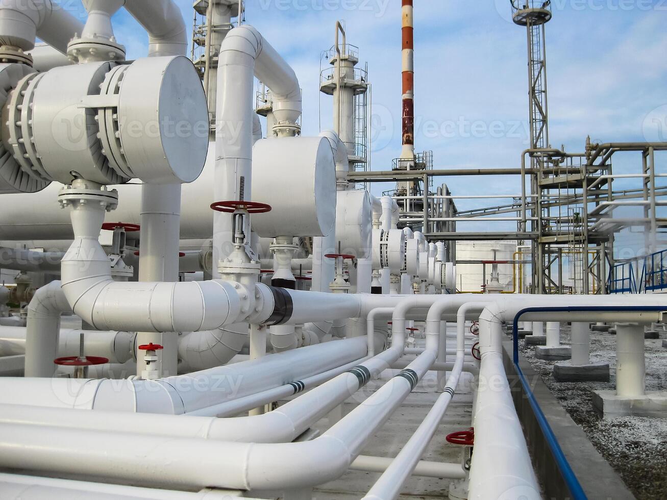 Heat exchangers in refineries. The equipment for oil refining. Heat exchanger for flammable liquids. The plant for the primary processing of oil photo