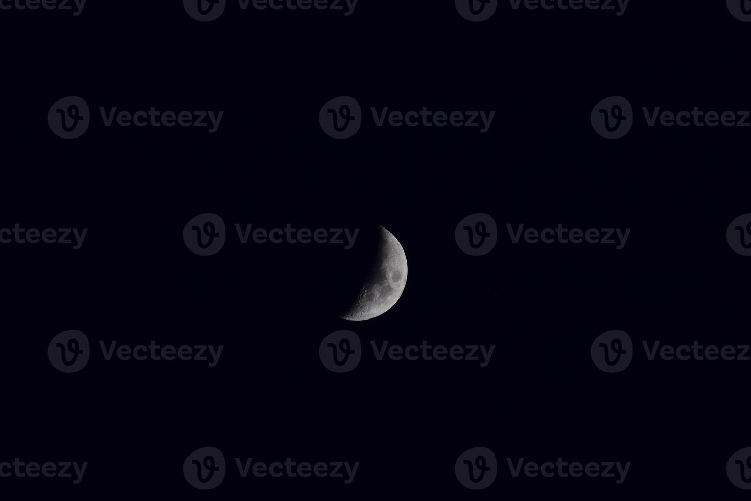 The moon in the night sky photo