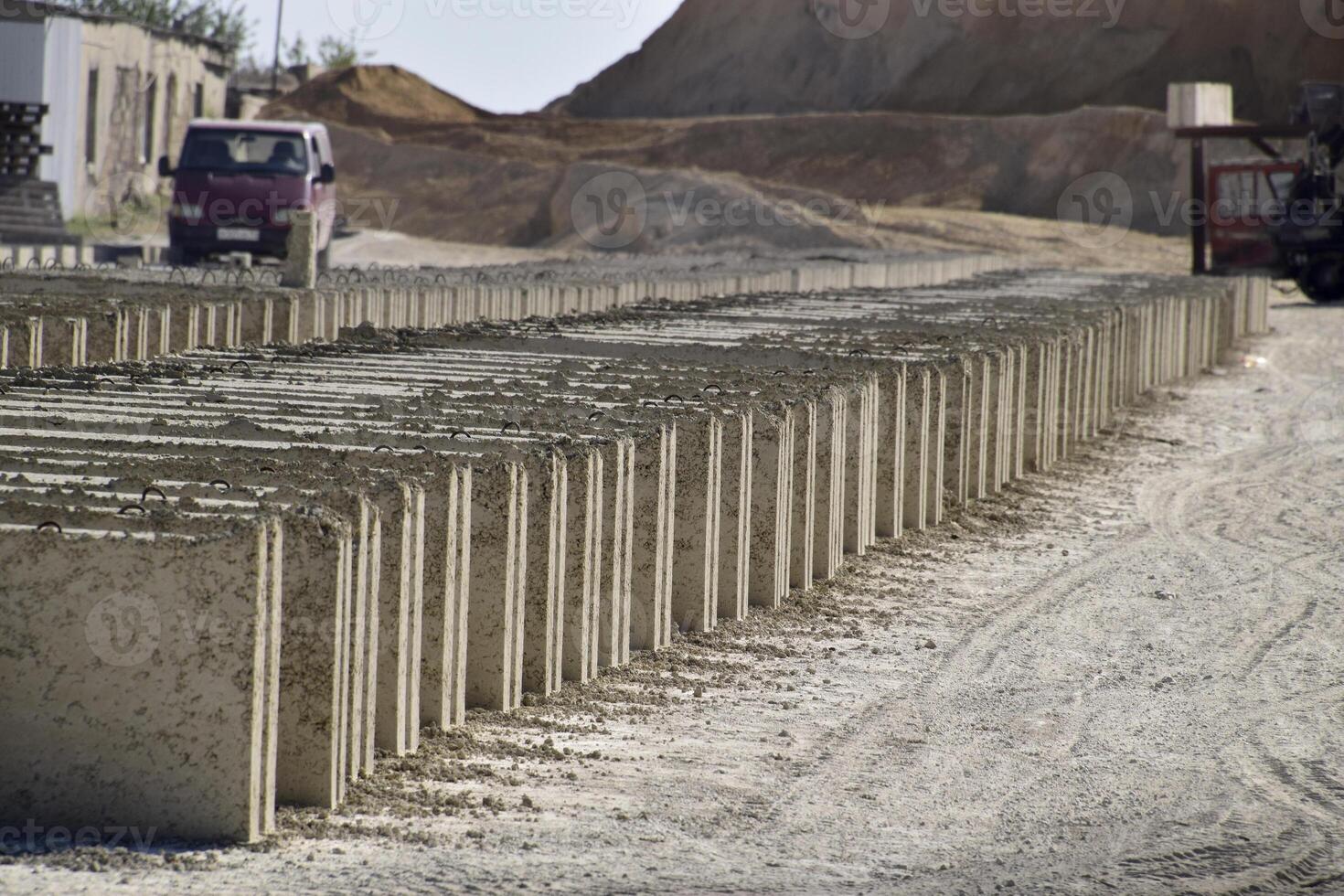 Cinder blocks lie on the ground and dried. on cinder block production plant. photo