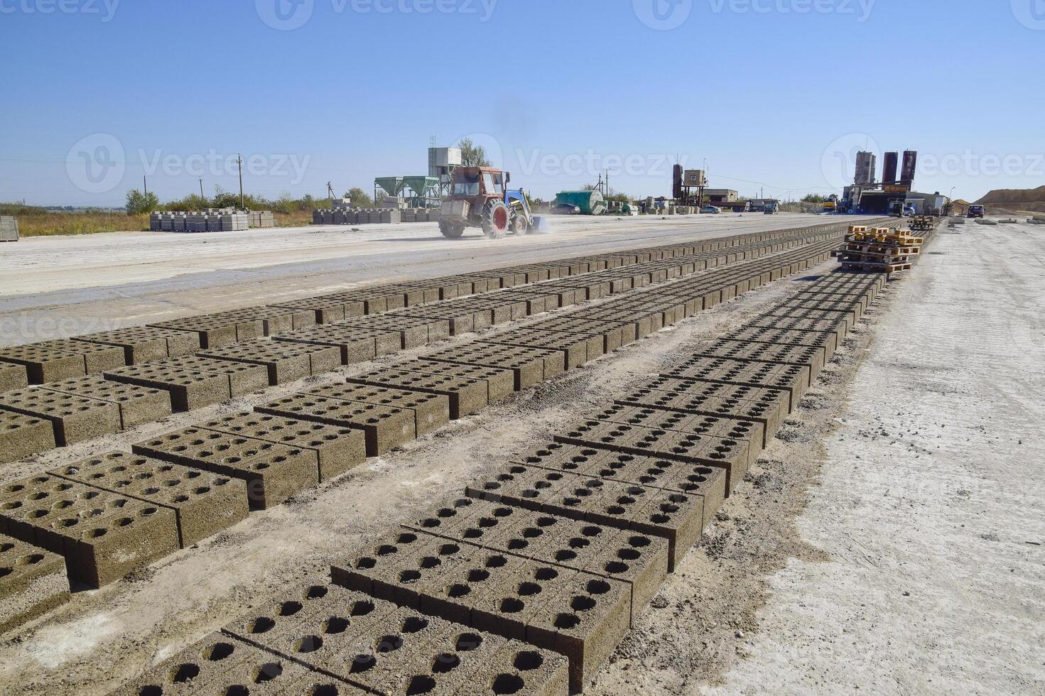 Cinder blocks lie on the ground and dried. on cinder block production plant. photo