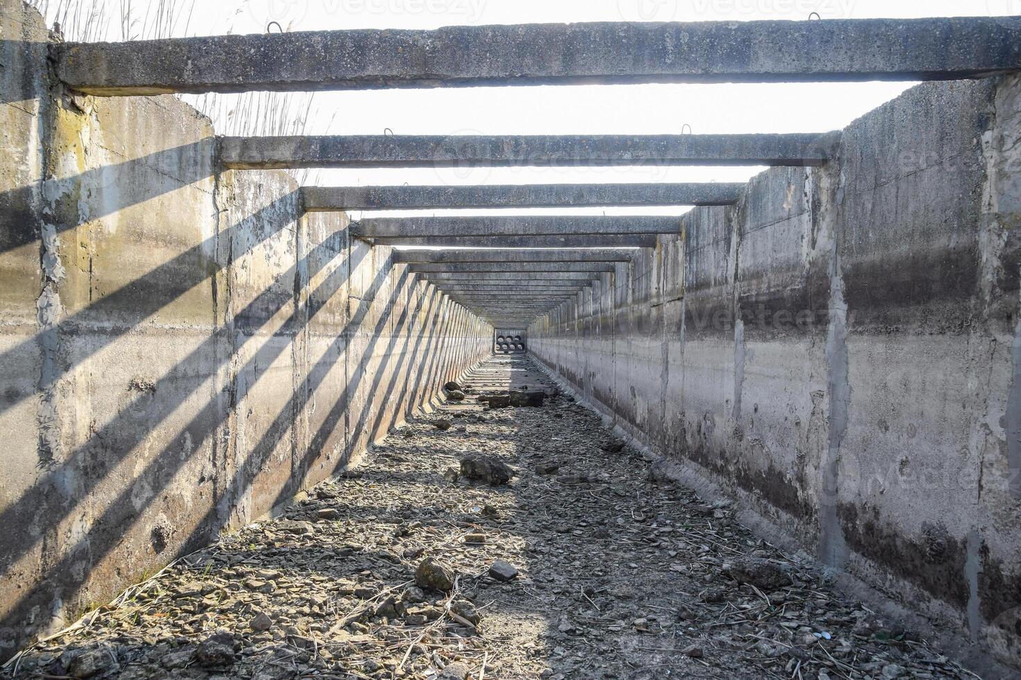 inside view of the irrigation artificial concrete channel. photo