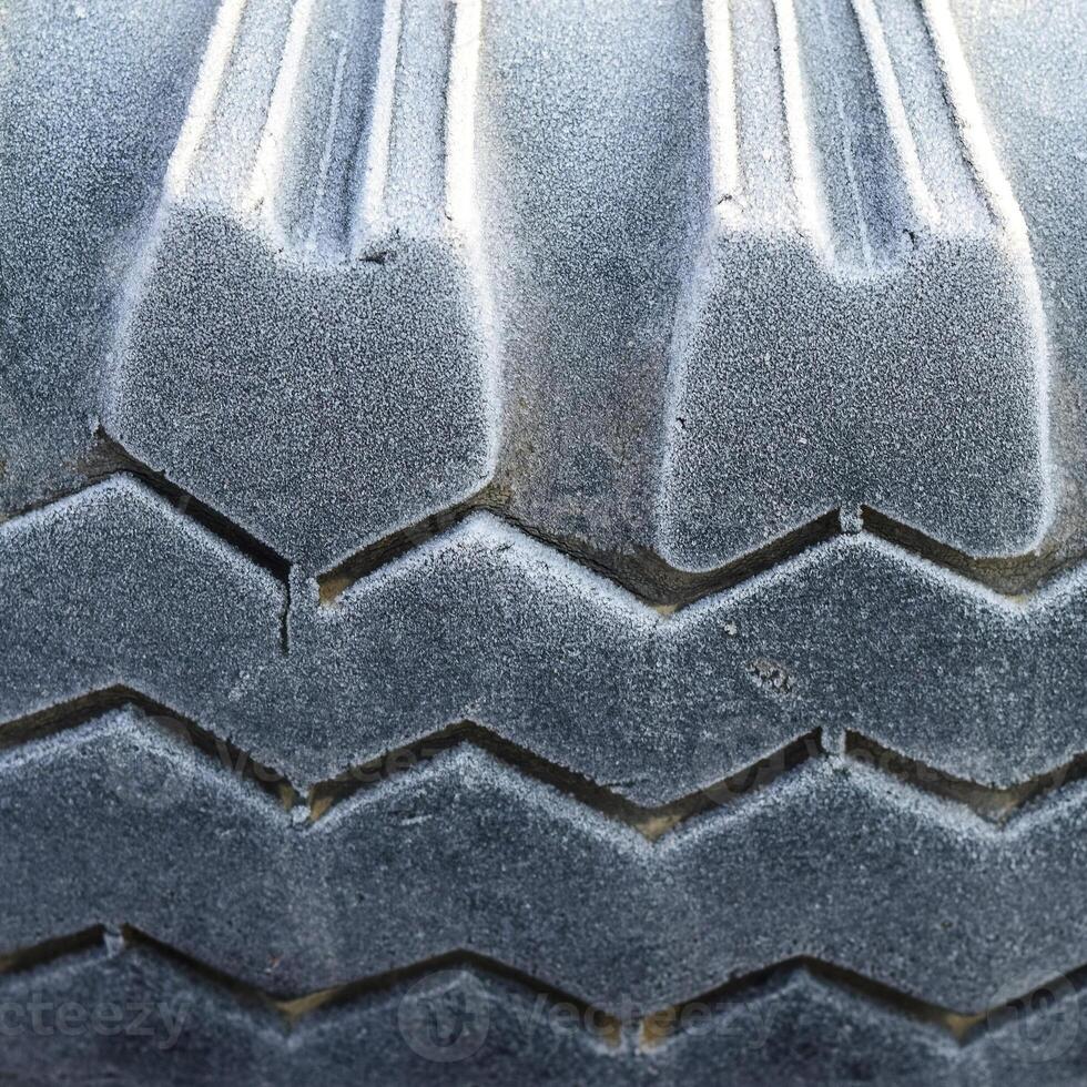 Hoarfrost on a rubber tire wheel photo