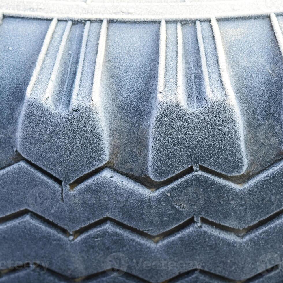 Hoarfrost on a rubber tire wheel photo