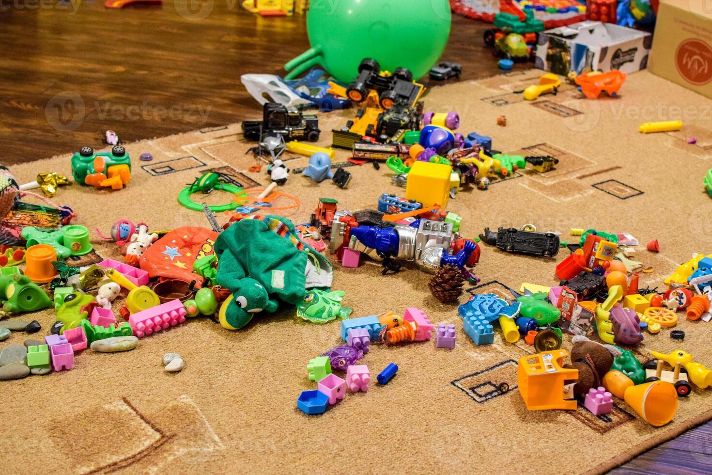 Childrens toys on the carpet. Bardak in the childrens room photo