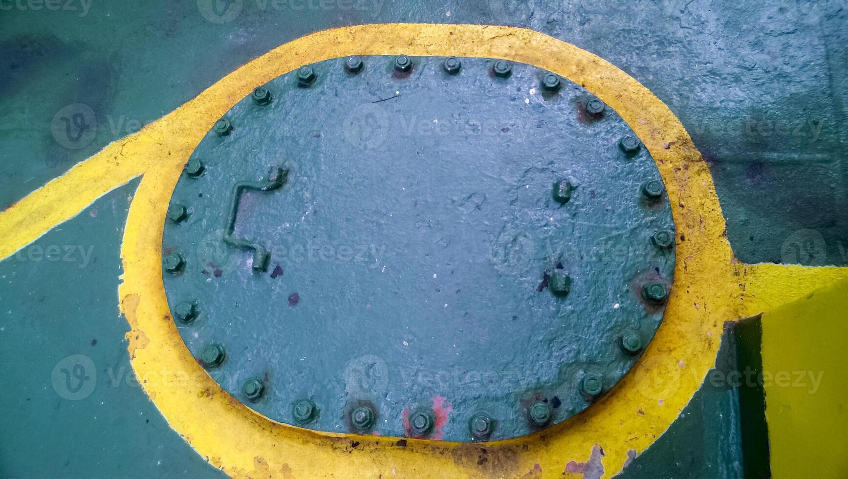 Technological hatch on the deck of the ship. Service inputs. photo