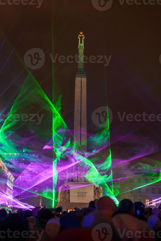 Evening Festivities by the Freedom Monument in Riga, Latvia. photo