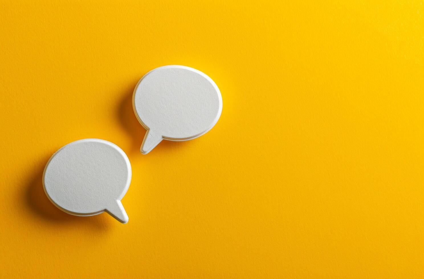 AI generated two speech bubbles on a yellow background photo