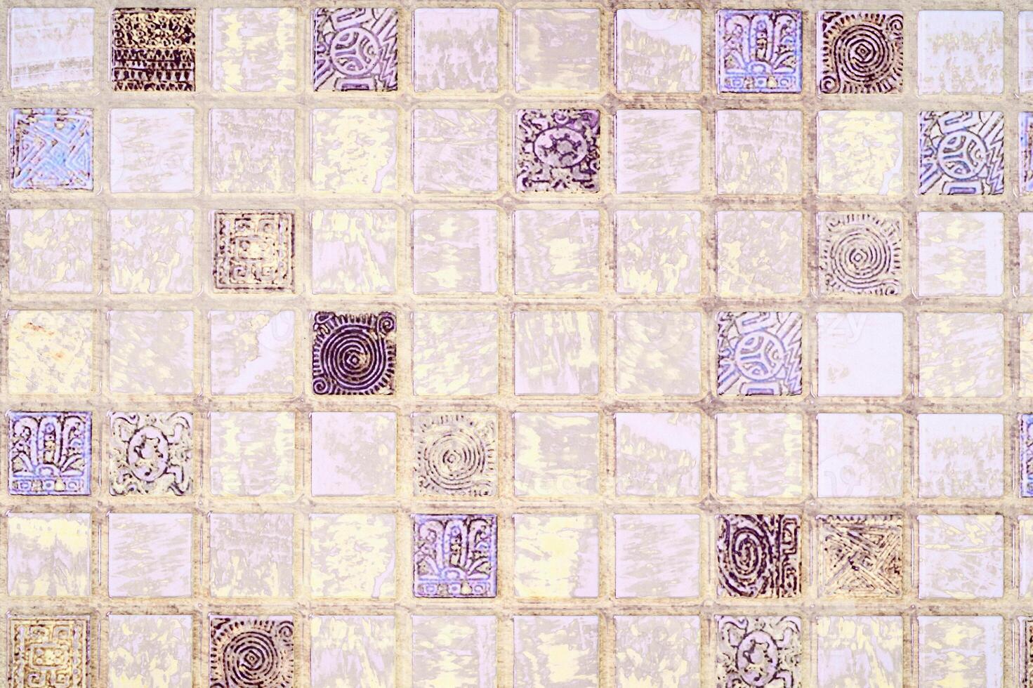 Checkered ornamental warm surface with cool purple pale colors photo