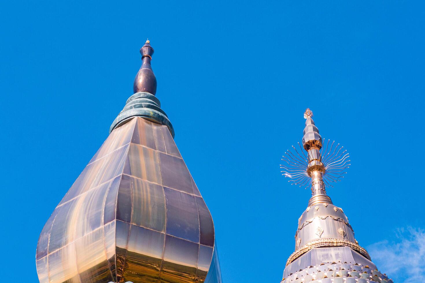 The massive aluminum-covered Buddhist stupa. photo