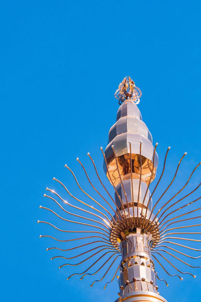 The massive aluminum-covered Buddhist stupa. photo