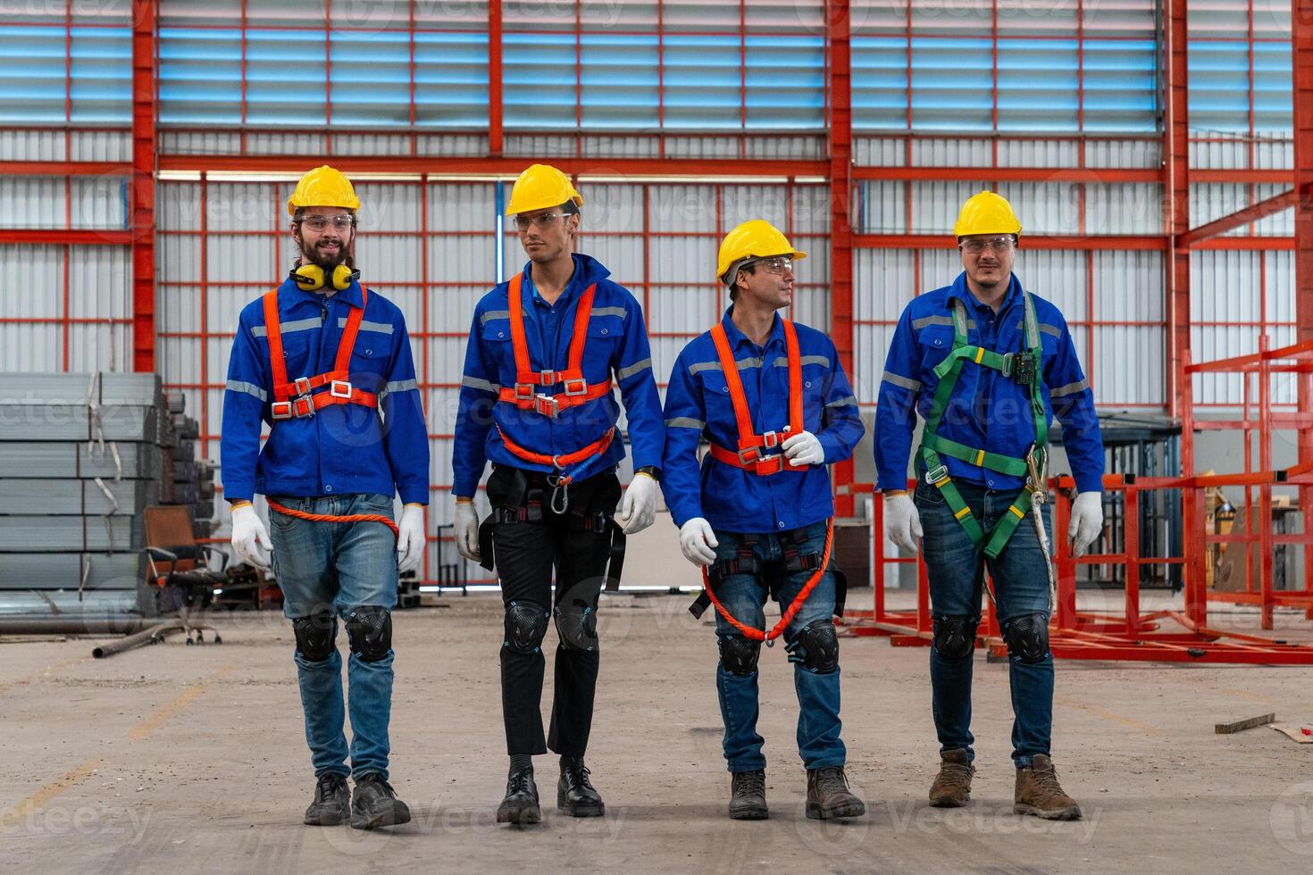 Craftsmen team is successful and makes high five motivation in a factory hallProfessional industry engineer and factory foreman worker team person Wearing safety helmet hard hat, Technician Team. photo