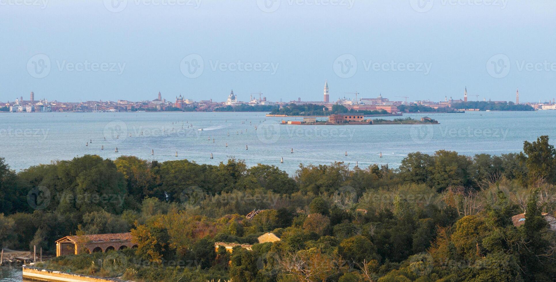 Aerial view of the plagued ghost island of Poveglia in the Venetian lagoon photo