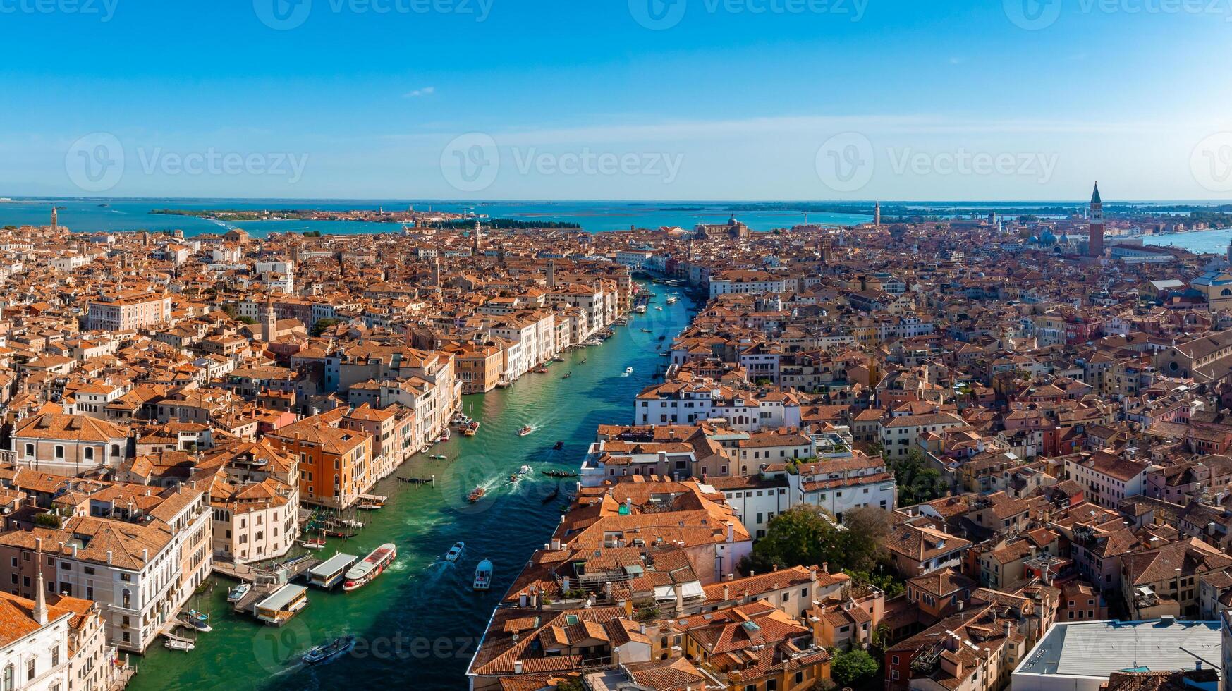 Aerial View of Venice near Saint Mark's Square, Rialto bridge and narrow canals. photo