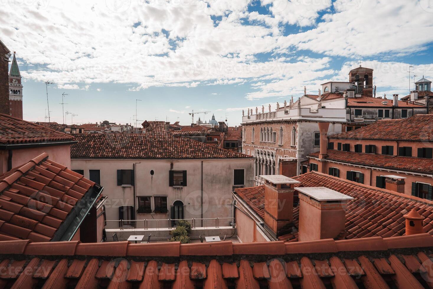 Tranquil Venice Serene Cityscape View with Red Roofs and Charming Buildings photo