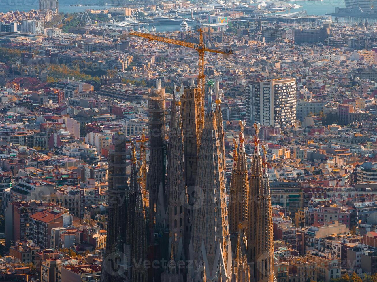 Aerial view of Barcelona City Skyline and Sagrada Familia Cathedral at sunset photo