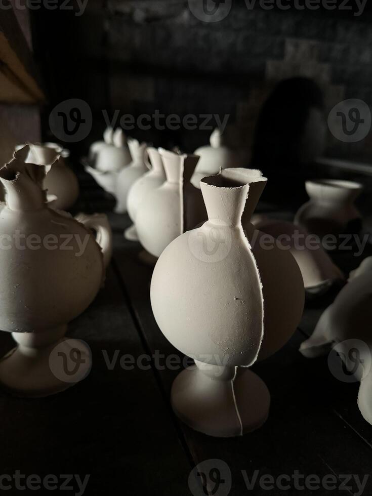 Clay blanks for a kerosene lamp in a pottery workshop. Close up photo