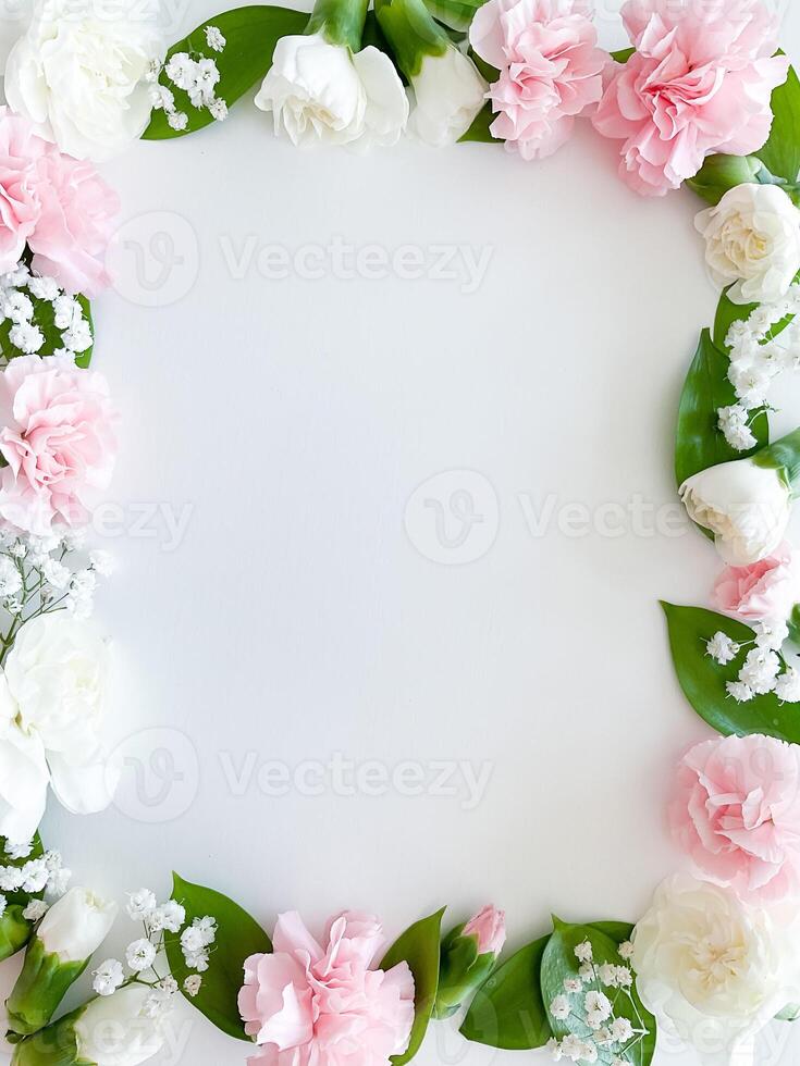 Pink floral. assorted pink flowers border on white photo