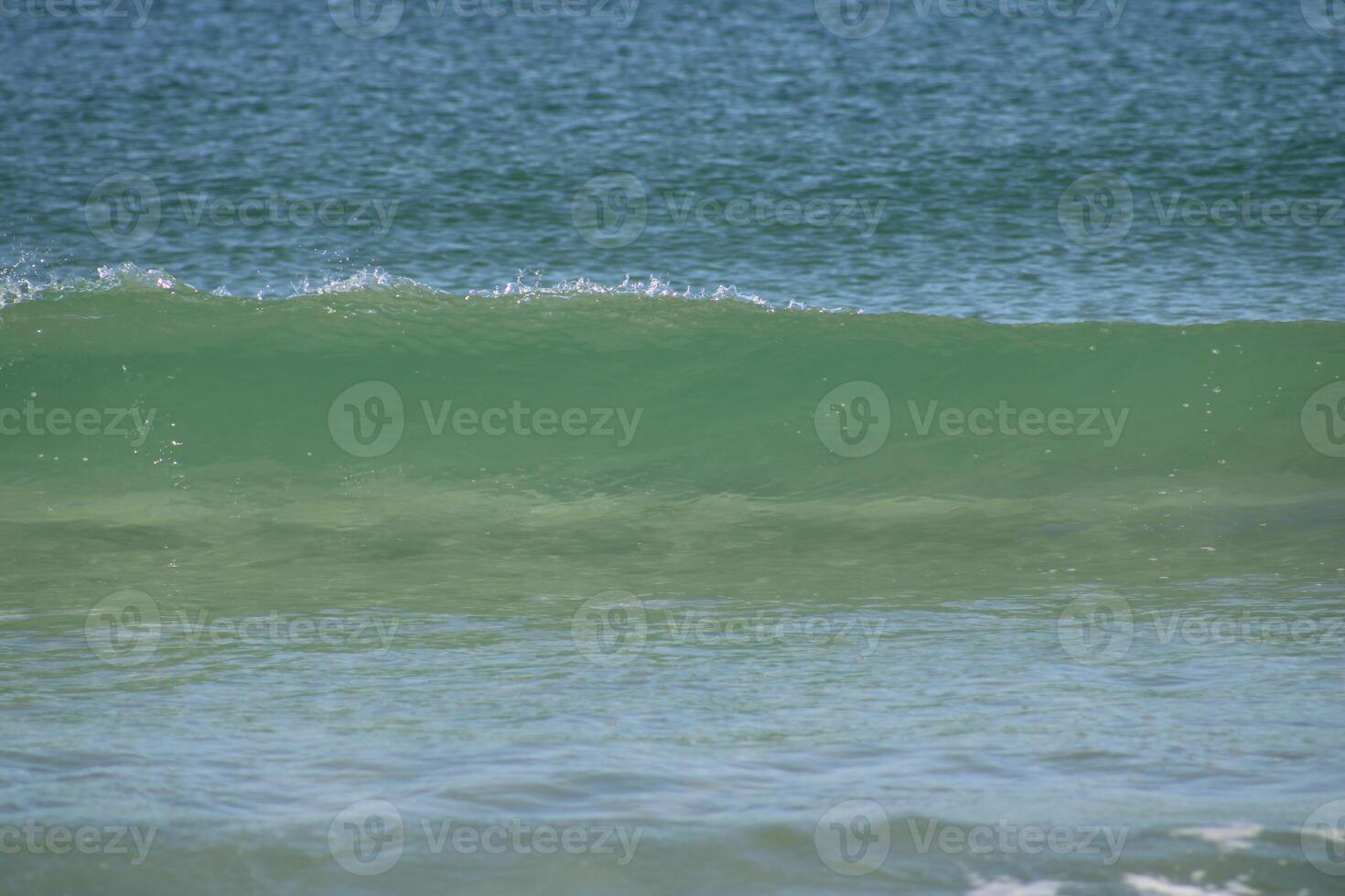 Beach front sand and waves photo