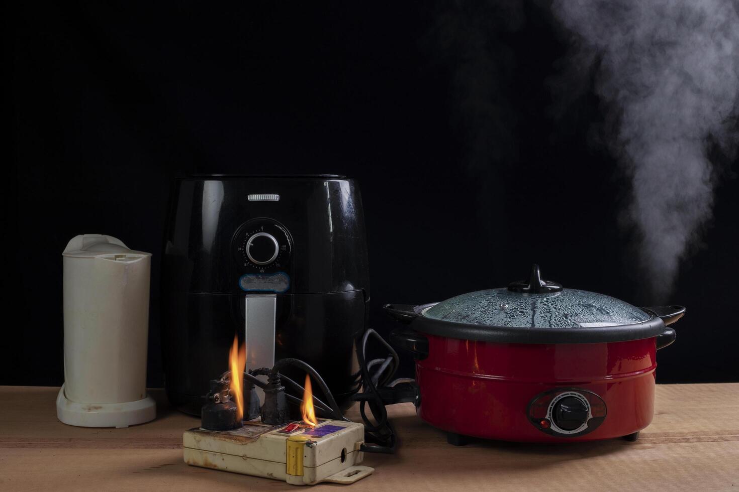 Short circuit, causing flames and smoke. fire The dangers of using non-standard equipment overload photo