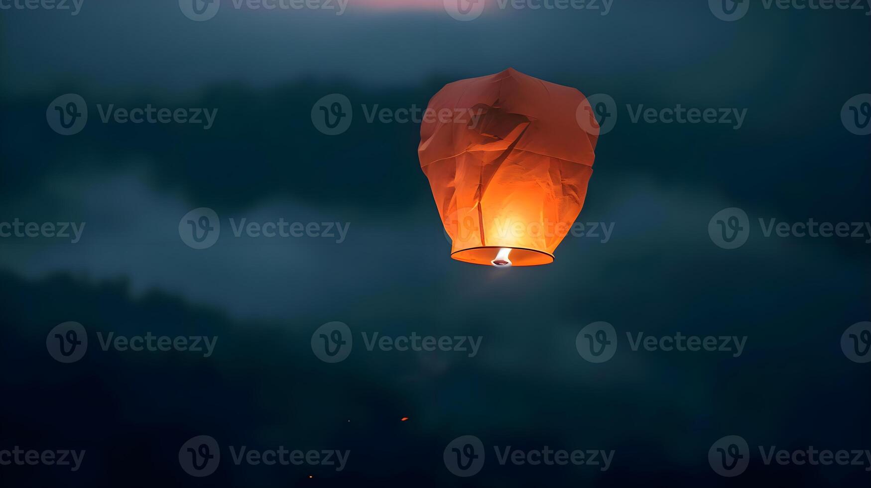 AI generated a sky lantern flying through the sky at night photo