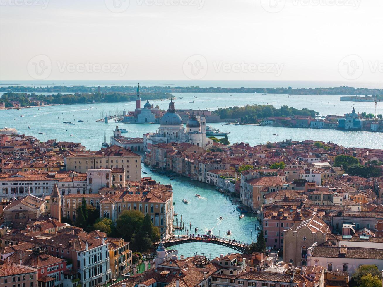Aerial View of Venice near Saint Mark's Square, Rialto bridge and narrow canals. photo
