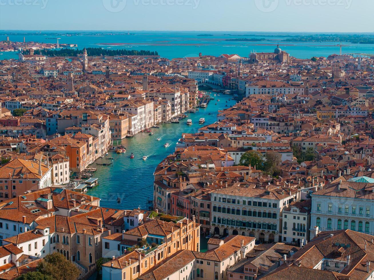 Aerial View of Venice near Saint Mark's Square, Rialto bridge and narrow canals. photo