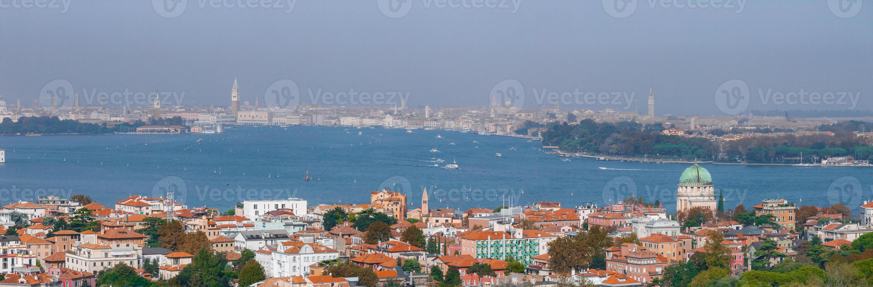 Aerial View of Venice near Saint Mark's Square, Rialto bridge and narrow canals. photo