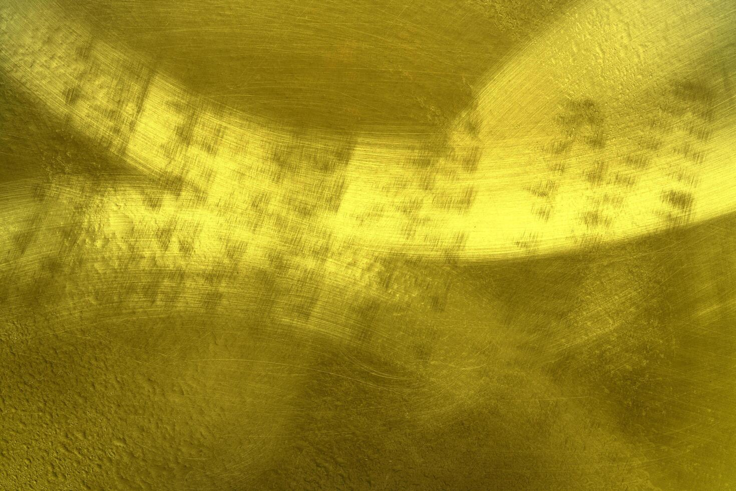 Shiny golden metal wall texture background,gold pattern photo
