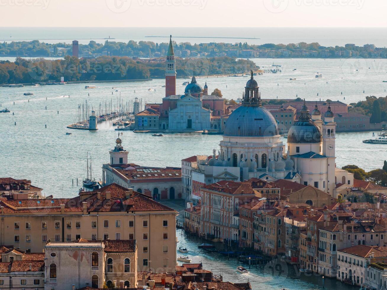 Aerial View of Venice near Saint Mark's Square, Rialto bridge and narrow canals. photo