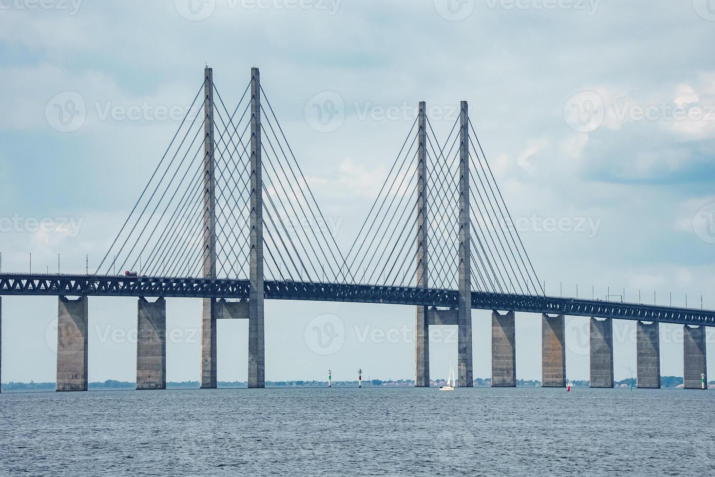 Oresund Bridge Connecting Copenhagen and Malmo on an Overcast Day photo