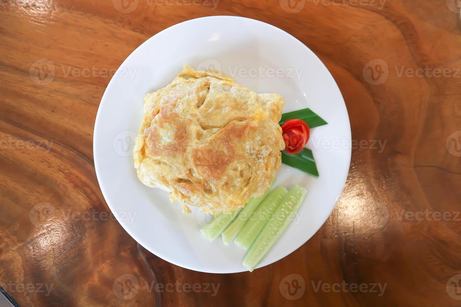 omelette, omelet or deep fried egg and rice photo