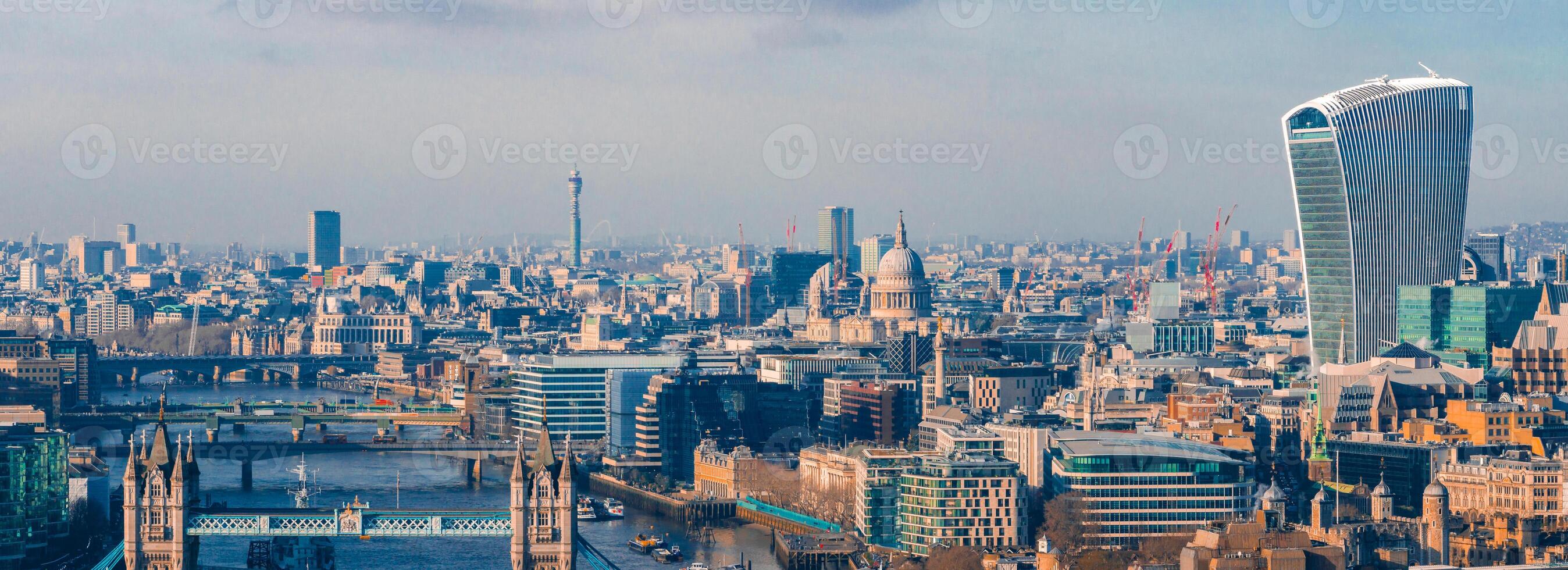 Aerial view of the Iconic Tower Bridge connecting Londong with Southwark photo