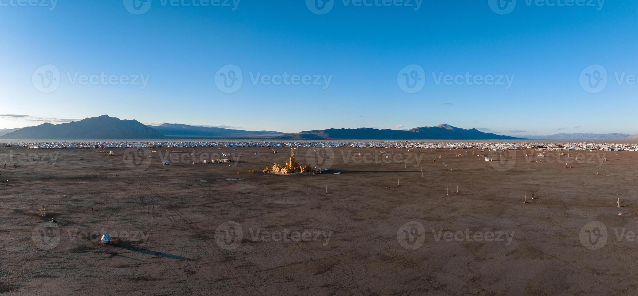 Aerial view of the festival in a desert with beautiful art installations photo