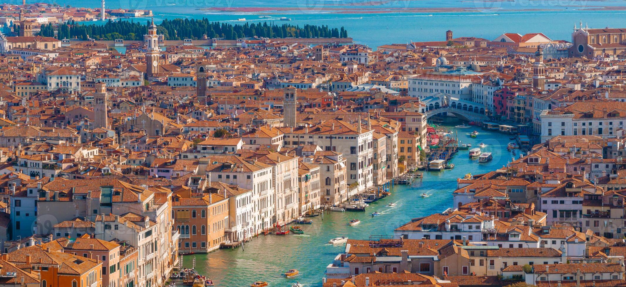 Aerial View of Venice near Saint Mark's Square, Rialto bridge and narrow canals. photo