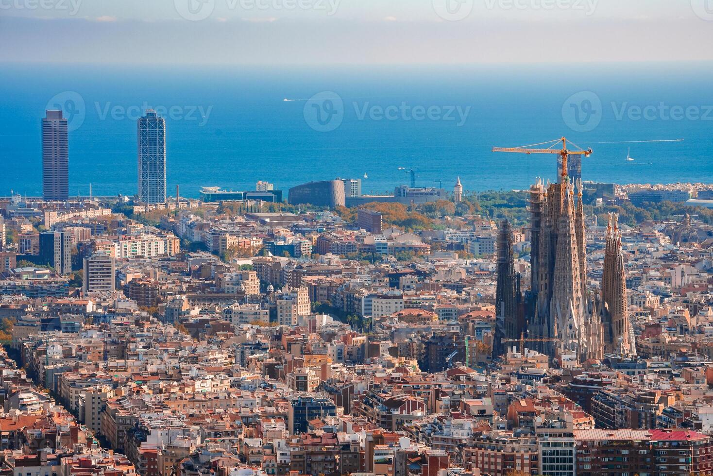 Panoramic View of Barcelona with Sagrada Familia and Mediterranean Sea photo