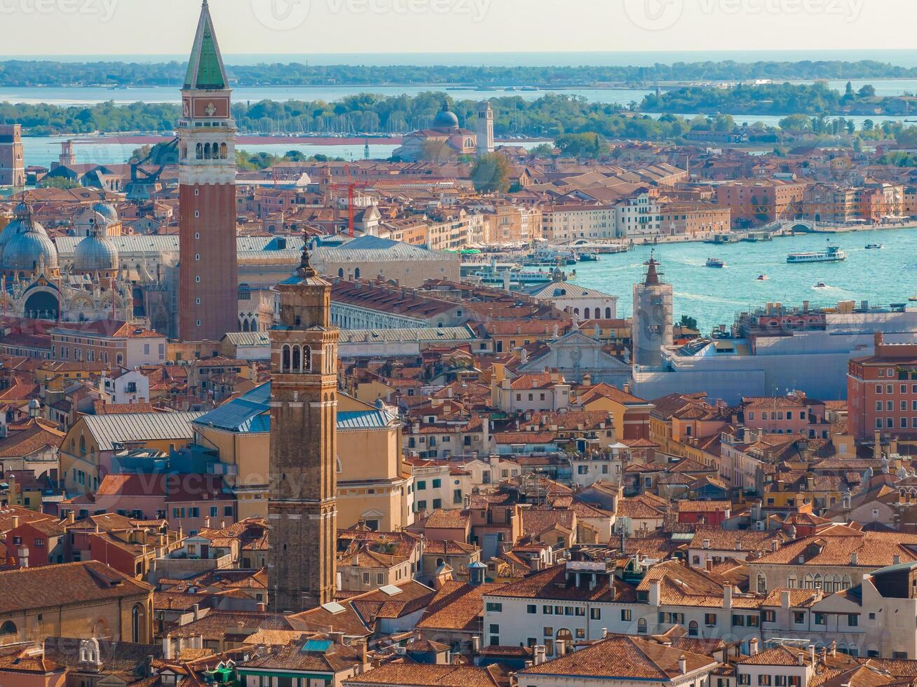 Aerial View of Venice near Saint Mark's Square, Rialto bridge and narrow canals. photo