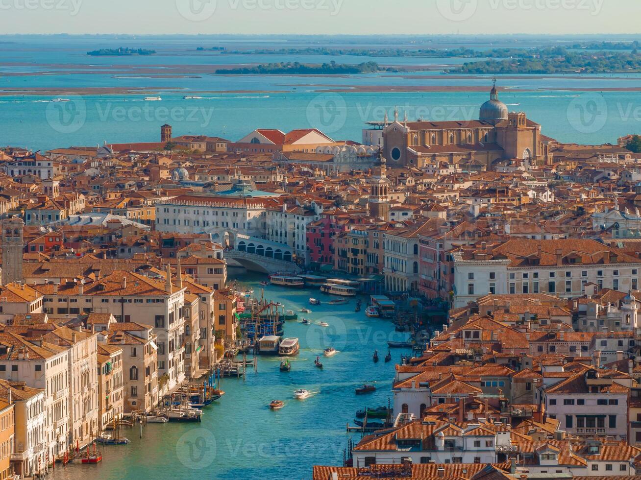 Aerial View of Venice near Saint Mark's Square, Rialto bridge and narrow canals. photo