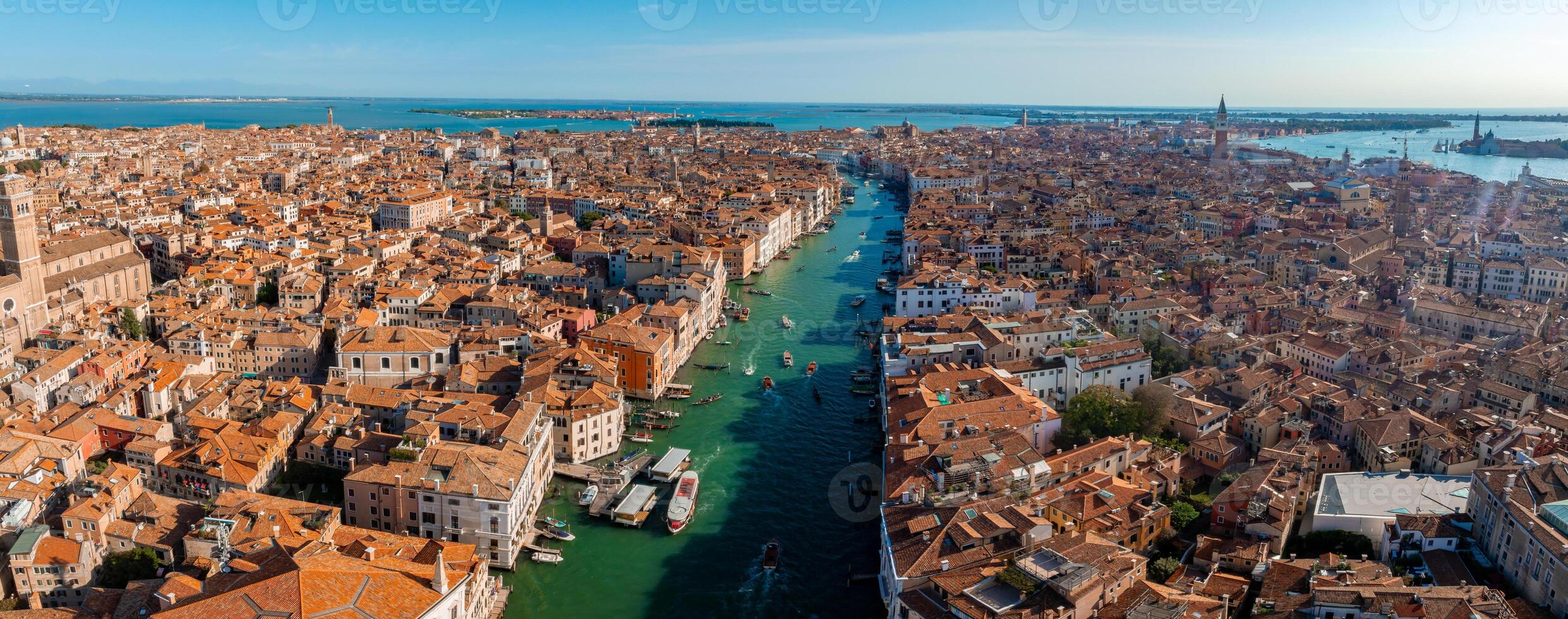 Aerial View of Venice near Saint Mark's Square, Rialto bridge and narrow canals. photo
