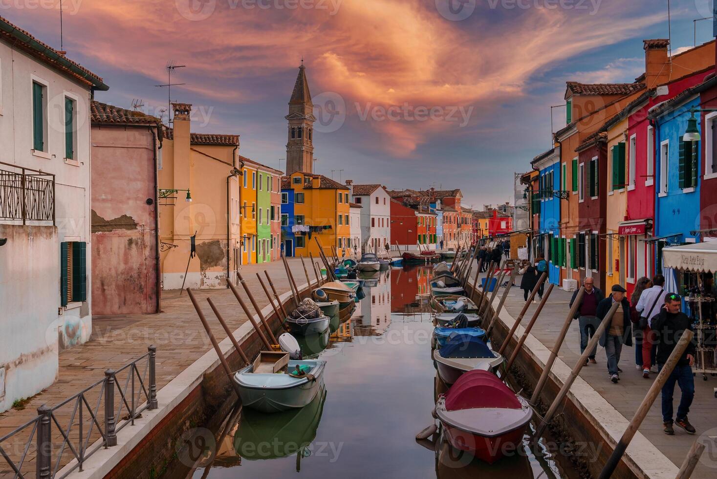 Charming and Colorful Canal in Burano, Italy with Vibrant Buildings and Boats photo