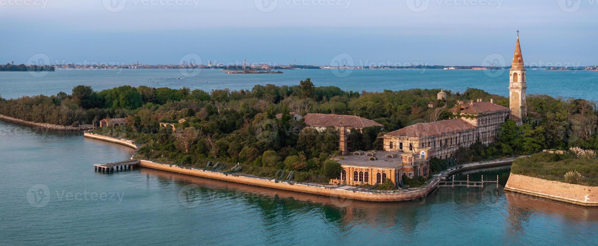 Aerial view of the plagued ghost island of Poveglia in the Venetian lagoon photo