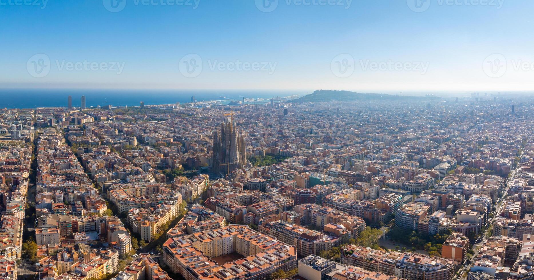 Aerial view of Barcelona City Skyline and Sagrada Familia Cathedral at sunset photo