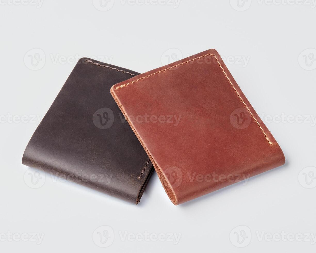 Pair of stylish mens leather wallets with custom embossing photo