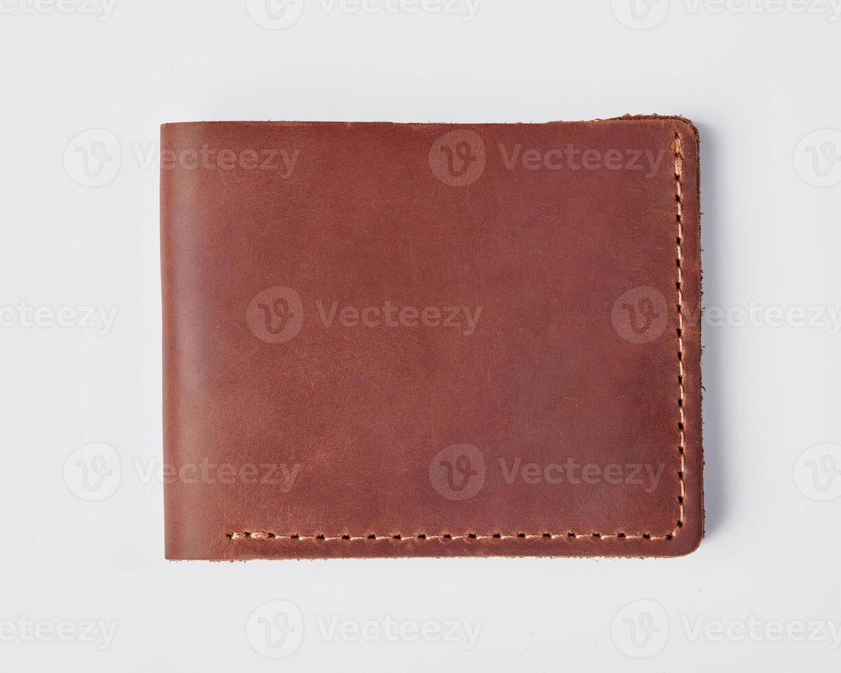 Personalized brown leather billfold wallet with embossing on white photo