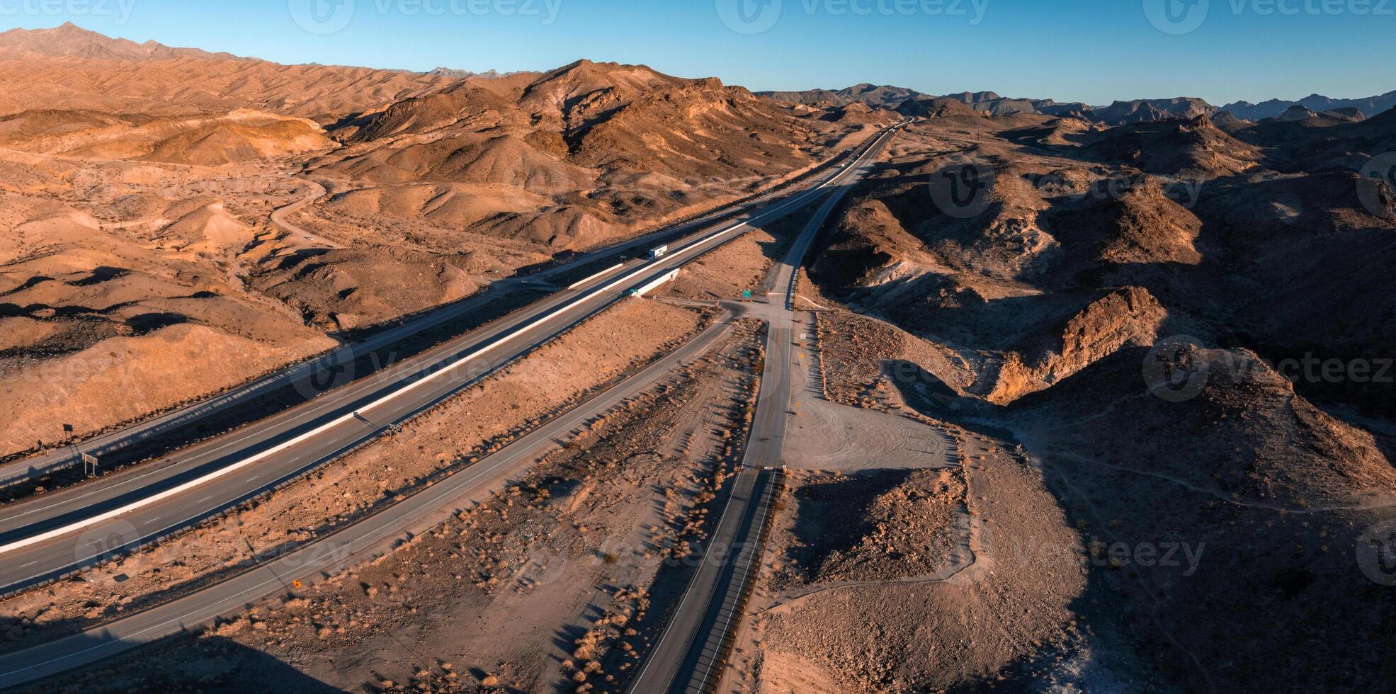 Aerial view of a road near colorful rock textures, near Vermilion Cliffs National Monument photo