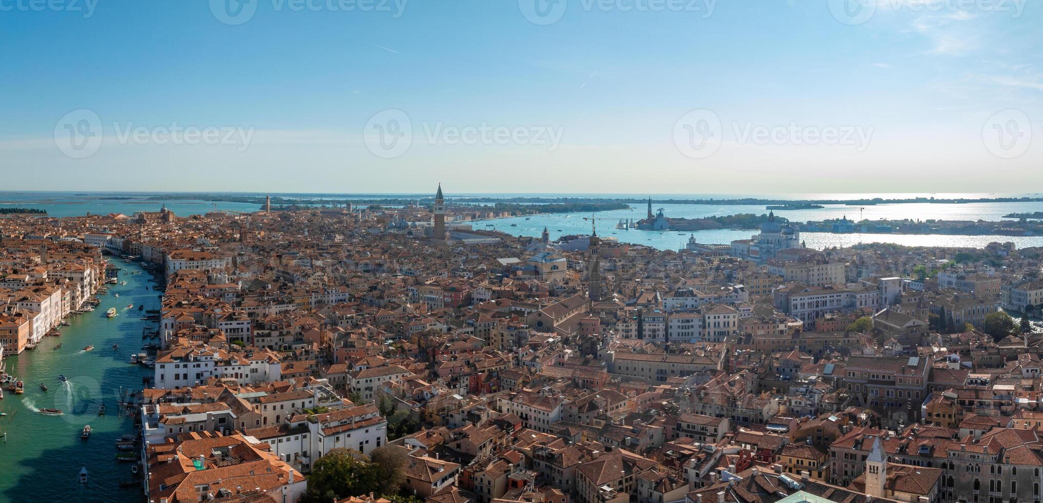 Aerial View of Venice near Saint Mark's Square, Rialto bridge and narrow canals. photo