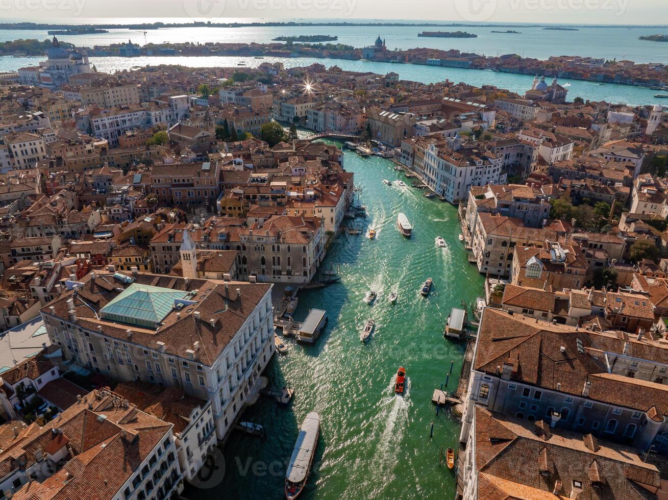 Aerial View of Venice near Saint Mark's Square, Rialto bridge and narrow canals. photo