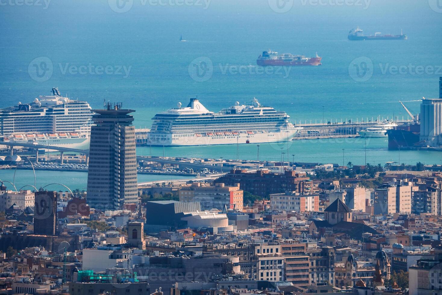 Expansive Panoramic View of Barcelona, Port, and the Mediterranean Sea photo